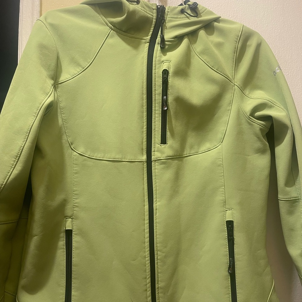 A brand new green coat